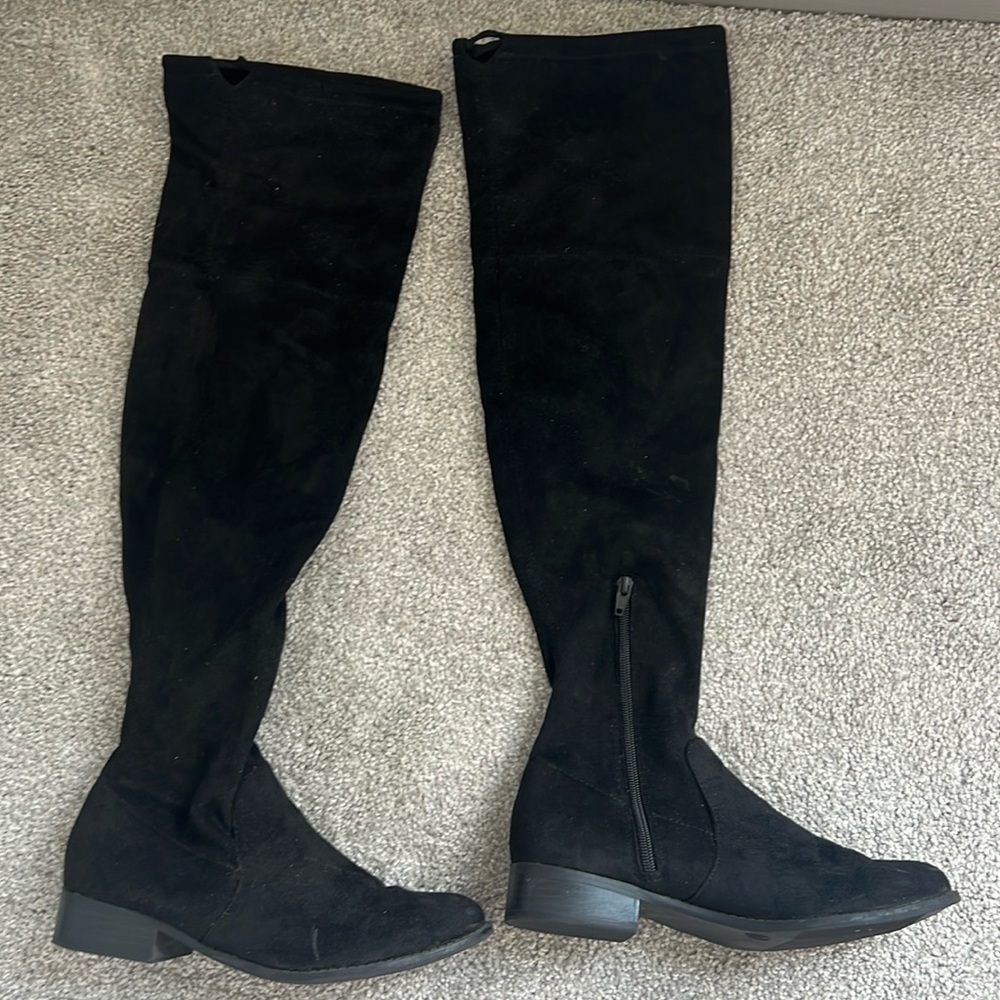 Black, knee high boots, tie inside of boot for adjustment, barely  worn